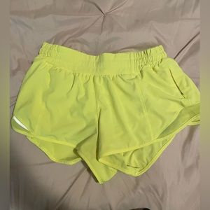 size eight lululemon hotty hot shorts in neon yellow